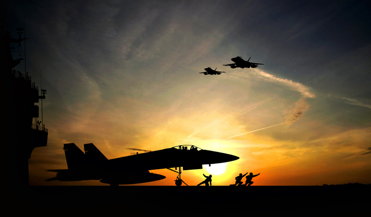 Naval plane at sunset